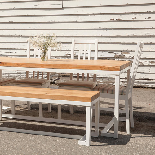 Reclaimed butcher block table and steel frame.